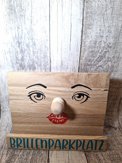 Niedlicher Holz-Brillenparkplatz mit Gesicht, ideal zur praktischen und dekorativen Aufbewahrung von Brillen.