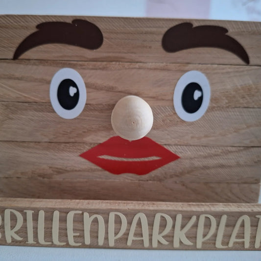 Niedlicher Holz-Brillenparkplatz mit Gesicht, ideal zur praktischen und dekorativen Aufbewahrung von Brillen.