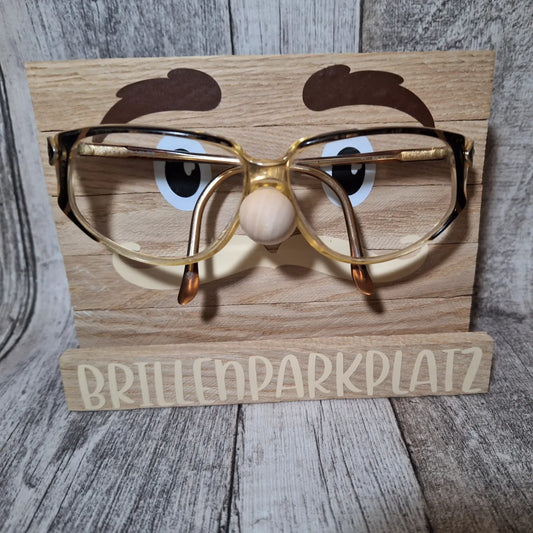 Niedlicher Holz-Brillenparkplatz mit Gesicht, ideal zur praktischen und dekorativen Aufbewahrung von Brillen.