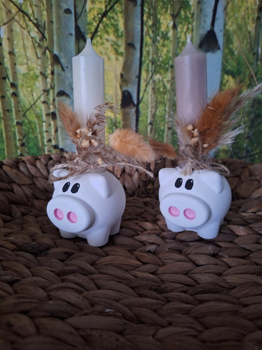Handbemalter Keraflott Glücksschein-Schwein als Stabkerzenhalter mit bunten Nasenlöchern und liebevollen Details, ideal als Glücksbringer und Dekoration für Zuhause.